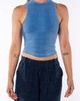 Woman wearing Scallop Tank in Blue Wave and navy day pants.