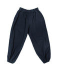 A pair of dark navy pants with an elastic waistband and large front pockets.
