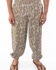 Man wearing Leopard Camo day pants. 